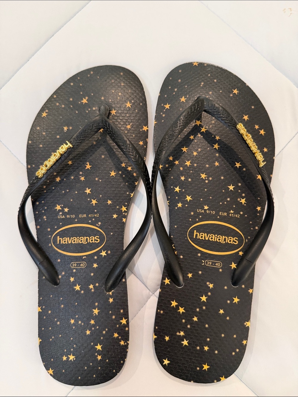 Havaianas black and gold flip flop